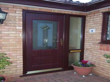 Dr A. Bromborough , Wirral. Rosewood Rockdoor combination with designed bevel glass double glazed 